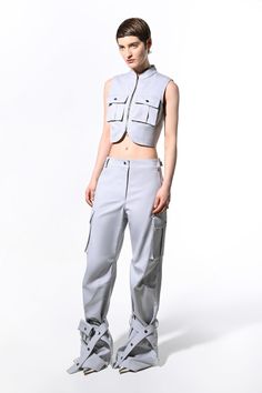 Mid-waist cargo-fit pants. Functional pockets on each side. Removable and adjustable belts with pocket on the bottom. Color: light grey. Shell: 65% Polyester; 35% Cotton Made in Georgia Cargo Top, Cargo Fit, Fit Pants, Adjustable Belt, Recycled Cotton, Workout Pants, Online Purchase, Color Light, Cargo Pants