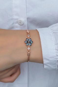 Mystical Topaz Stone Six Petals Flower Bracelet └ Item Made of 925 Sterling Silver. -925 sterling silver Weight: 5,70 Gr, Chain length: 20 cm, Aquamarin Coating Rose plating -It does not darken as long as contact with chemicals is avoided. -All of our products are sent with an elegant box, carefully packed. -Free Shipping *If you have any problems with the product, you can write here. (alpisik8@gmail.com) قلادات متدلية, Unghie Nail Art, Fancy Jewellery Designs, Magical Jewelry, Jewelry Accessories Ideas, Girly Accessories, Casting Jewelry