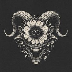 an animal skull with large horns and sunflowers on it's face, in black and white