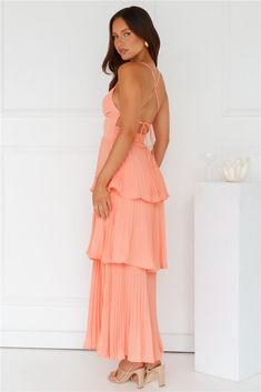 Length from bust to hem of size S: approx. 113cm. Chest: 36cm, Waist: 32cm, across front only of size S. Maxi dress. Semi-lined. Model is a standard XS and is wearing size XS. True to size. Non-stretch. Pleated design. Tiered flowy skirt. V-neck. Crisscross tie-up back. Elastic back. Zipper. Cold hand wash only. Polyester. Channel your classy side in the Fashionably Ever After Maxi Dress. Featuring a pleated design, a tiered frill skirt and a crisscross tie-up back. Style with heels for a fancy Coral Formal Dress, Peach Prom Dress, Peach Prom Dresses, Coral Pink Dress, Peach Color Dress, Fancy Event, Random Outfits, First Day Outfit, Frill Skirt