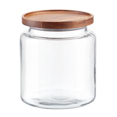 a glass jar with a wooden lid