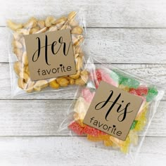 two bags filled with different flavored candies on top of a white wooden table