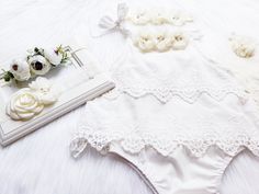 "OFF WHITE BOHO ROMPER Elegant super soft romper embellished with beautiful quality chiffon flowers with jewels and pearls. {use} *Birthday, *Baptism, *Easter, *special occasions, *picture props, *weddings, *for fun! Available dress sizes below: 0-6 months 6-12 months 12-24 months 2T CHOICE OF HEADBANDS-- #1 #2 #3 #4 Beautiful matching headbands adorned with jeweled flower and can be also made on hard headband or alligator clip. If you need hard headband or on alligator clip, please leave a note Fitted White Bubble Romper For First Birthday, First Birthday Cotton Romper In Cream, Off White Outfit, Spring Cotton Bubble Romper With Lace Trim, White Cotton Bubble Romper With Lace Trim, Lace Romper Baby, Birthday Boho, Picture Props, Boho Romper