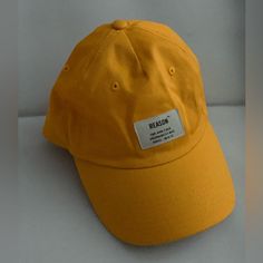 Yellow Color With Brand Tag Nwot Casual Snapback Flat Cap For Spring, Everyday Summer Flat Cap Hat, Summer Everyday Flat Cap, Trendy Yellow Baseball Cap With Visor, Trendy Yellow Visor Baseball Cap, Basic Spring Cap Hats, Yellow Casual Snapback Hat, Casual Yellow Baseball Cap For Spring, Trendy Yellow Snapback Dad Hat