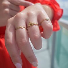 This irresistible minimalist ring has small waves. It's your new go-to-piece, and it will never go out of style! Precious Metal: 14K Solid Gold Size: 7 Comes in our beautiful gift box Other pieces shown on the pictures are sold separately ***Note: Prices and availability are subject to change without notice. Follow us on Instagram Don't know your ring size? Download and print our "Ring Sizing Guide" ***make sure to print it at 100% size Everyday Wavy Yellow Gold Jewelry, Modern 14k Gold Wavy Jewelry, Minimalist Wavy Yellow Gold Ring, Minimalist 14k Gold Wavy Ring, Yellow Gold Wavy Jewelry With Polished Finish, Minimalist Ring, Minimalist Rings, Precious Metal, Beautiful Gift Boxes