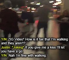 a blurry photo of people walking down the street at night with text that reads, yn't ig video how is it fair that i'm that i'm walking and they aren?