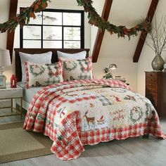 a christmas themed bed in a loft