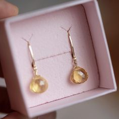 Sparkling Genuine Citrine Dangle Earrings, Handmade by BoutiqueBaltique.  MATERIALS: * 14k Solid Gold * natural citrine * dangling from leverbacks * beautiful branded gift box + card about citrine SIZE: stones: 8x8 mm; earrings: 2.5 cm or 1" MAKE A SET: Matching necklace: https://etsy.me/2zrtFer CITRINE: ∙ November Birthstone ∙ 13th Wedding Anniversary Gemstone ∙ Talisman for Aries, Gemini, Leo, Libra ∙ Sacral Chakra (Swadhisthana)  Citrine symbolizes wealth, prosperity, and success. It clears the mind and stirs to action, imparting enthusiasm and delight in things the wearer does. Citrine carries the power of the Sun, which turns negative energies into positive ones and enriches the life of the wearer. SEE MORE: Citrine Jewelry:  http://etsy.me/2dkORJO  November Birthstone Jewelry:  http: Gift Yellow Gold Jewelry With Lever Back Ear Wires, Faceted Drop Earrings As Gift, 14k Gold Briolette Earrings Gift, Citrine Jewelry For Pierced Ears As A Gift, Handmade Yellow Gold Briolette Earrings, Teardrop Citrine Jewelry For Gifts, Handmade Briolette Yellow Gold Earrings, Yellow Faceted Earrings As Gift, Yellow Briolette Jewelry For Gift