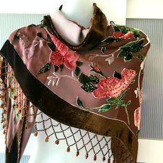 Absolutely stunning shawl designed in Art Deco style by Rabella. Flamboyant and highly decorative it is made with a burnout velvet technique with a 100% silk base. The shawl is embroidered and beaded (feels pretty heavy) with jeweled ends. The shawl is brown featuring various pink shades of gorgeous roses. It measures 34x66 inches. You can use it as a unique piece of accessory or even a home decor to create a special atmosphere of vintage elegance. The shawl will definitely make a luxury gift. I Vintage Shawl With Traditional Drape For Wedding, Vintage Wedding Shawl With Traditional Drape, Handmade Silk Shawl, Bohemian Wedding Shawl With Motifs, Bohemian Wedding Scarves With Traditional Drape, Wedding Shawl Scarf With Motifs, Bohemian Wedding Scarves With Intricate Embroidery, Wedding Shawl With Motifs, Wedding Shawl With Intricate Embroidery