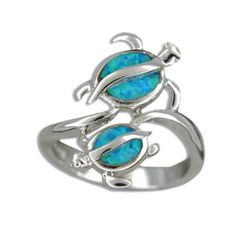 "Sterling Silver Hawaiian Double Honu Blue Opal Ring. 1\" in diameter with Blue Opal Inlay. Size 5 to 10 are available. This ring is made with sterling silver and finished with Rhodium to avoid tarnishing." Blue Opal Jewelry, Turtle Ring, Purple Dye, Island Jewelry, Blue Opal Ring, Hawaiian Jewelry, Blue Hawaiian, Feather Jewelry, Sea Turtles