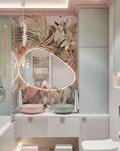 the bathroom is decorated in pastel colors and has a large mirror over the sink