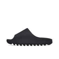 a black slipper with white soles