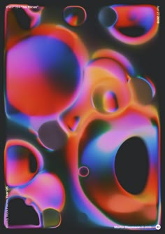 an image of colorful bubbles on a black background