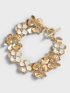 Floral Statement Bracelet | Banana Republic Chic Jeweled Jewelry, Gold-tone Bracelet, Glamorous White Jeweled Jewelry, Glamorous Jeweled White Jewelry, Gold-tone Bracelet With Clasp, Adjustable White Jeweled Jewelry, Gold-tone Jeweled Metal Jewelry, Elegant Party Jewelry With Toggle Clasp, Chic White Metal Jewelry