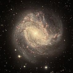 an image of a spiral galaxy in the sky