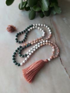 ◈ Each Mala purchase will include a card describing the stones healing properties and a Mantra card ◈ WHAT IS A MALA? Malas are traditionally used for Meditation and Prayer. These 108 bead Malas are made with semi-precious stones that hold beautiful energy within each stone. 108 is significant for so many reasons and there are many interpretations for the number 108. Some say that there are 108 stages on the journey of the human soul while others believe 108 centering breaths will bring enlighte Holistic Crystal Necklaces With 8mm Beads For Meditation, Holistic Crystal Necklace With 8mm Beads For Meditation, Holistic Crystal Necklace For Meditation With 8mm Beads, Multicolor 108 Beads Mala For Meditation, Spiritual 8mm Beads Mala As Gift, Multicolor Mala With 108 Beads For Meditation, White 108 Beads Mala For Meditation, Spiritual Hand Knotted Mala As Gift, Holistic Round Beads Crystal Necklace For Meditation