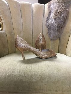 "These beautiful glitter high heels are covered in a rose gold glitter and sealed with a two step sealant that allows for movement and will not dull the shin of the glitter. This rose gold color is best described as a gold with a rose undertone. It is not an externally pink rose gold but does have a beautiful hint of pink undertones. Please note that the example heels in the photo are a size 8 shoe with a 3\" heel. Sizes 5-12 are available at checkout along with three different heel heights. All Glitter High Heels, Glitter Pumps, The Shins, Zeta Phi Beta, Open Toe Heels, Gold Pumps, Rose Gold Glitter, Rose Gold Color, Womens Heels