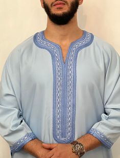 Mens Moroccan Thobe BEST PREMIUM QUALITY - SKY BLUE,|djellaba, Jubbah, Beautiful quality with a lovely soft feel and texture. Brand new, with original personal wrapping. We are known to many for our extensive Moroccan clothing collection. This is our newest collection yet, style and material carefully picked. BEST QUALITY! Extremely beautiful quality brand new Colour: SKY BLUE WITH WHITE DETAIL Material: Gabardine premium cotton blend Styles Loose Fit   Please follow these washing instructions f Blue Long Sleeve Agbada For Eid, Blue Long Sleeve Thobe For Eid, Blue Agbada With Dabka Detail, Blue Long Sleeve Thobe With Dabka Details, Blue Long Sleeve Thobe With Dabka, Traditional Blue Agbada With Dabka, Traditional Blue Long Sleeve Agbada, Traditional Blue Abaya With Dabka, Blue Traditional Abaya For Eid