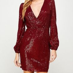 Twinkle Under The Lights In This Sequin Dress Perfect For Party Season! It Features Long Sleeves, A Surplice V-Neckline. The Lined Knit Fabric Offers A Moderate Stretch. Complete The Look In Suede Booties. Material: 95% Polyester, 5% Spandex Measurements: S- Bust 35", Waist 27, Hips 35", M- Bust 37", Waist 29, Hips 37" L- Bust 39", Waist 31, Hips 39" Red Sequin Dress, Sequins Dress, Red Sequin, Under The Lights, Suede Booties, Wine Red, Sequin Dress, Lady In Red, Knit Fabric