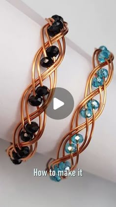 two bracelets with blue and black beads on them, one is made out of copper wire