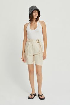 Thanks to the mid-length, the Daniel Bermuda Shorts will be a more practical go-to outfit choice to take you from business casual to off-duty. The shorts feature a front zipper closure with attached self belt, elastic waistband casing at back, side pockets and rear welt pockets, and front seam detail. Attached self belt with buckle detail Front zipper closure Elastic waistband casing at back Side pockets Rear welt pockets Front seam detail Hand wash Imported 100% Cotton Style No. CP8566 Model is High Waist Business Casual Shorts For Summer, Belted Shorts For Spring Workwear, Chic Business Casual Shorts With Belt Loops, Summer Workwear Shorts With Paperbag Waist, Summer Workwear Paperbag Waist Shorts, Belted Paperbag Waist Shorts For Work, Chic Belted Shorts For Work, Belted Bottoms For Business Casual Summer, Chic Bermuda Shorts For Workwear With Belt Loops