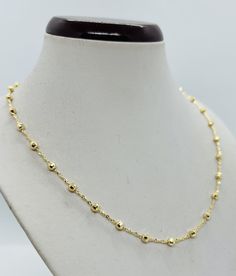 "14K YELLOW GOLD 3.5mm Diamond Cut Fancy Beaded chain These chains are made with solid 14k gold. The beads are 3.5mm in width and are connected with 1.5mm rolo style chain and is available in 16\", 18\", 20\",22\", 24\". Beaded chain are especially known for their shine. The chains are diamond cut and very shiny. Can be worn by itself or with a charm. The approximate weight of the 18\" is 8.4 grams. The chains have lobster claw for additional security. The chains have 14K marked for Authenticity 14k Gold Beaded Chain Necklace With Round Beads, 14k Gold Beaded Chain Necklace, Yellow Gold Beaded Necklaces With Delicate Chain, Yellow Gold Beaded Necklace With Delicate Chain, Yellow Gold Satellite Chain Necklace With Round Beads, Yellow Gold Beaded Chain Necklace With Round Beads, Gold Plated Yellow Gold Ball Chain Necklace, Yellow Gold Plated Round Beads Chain Necklace, 14k Gold Necklace With Ball Chain