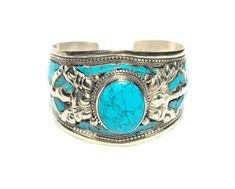 PRICES MAY VARY. Versatile Statement Piece - made of blue Stabilized-Turquoise & Argentium plated stainless steel, designed for men & women. SLIGHTLY ADJUSTABLE, very comfortable & fits most wrist sizes. High quality & Durable - Designed for everyday wear or special occasions. The perfect surprise gift for mom, dad, mum-in-law, sister, daughter, friend, or anyone else. Elegant accessory to up your jewelry fashion game. Bracelet comes with a cute, FREE jewelry pouch. Jewelry from Nepal - a bold c Gifts For Daughter In Law, Boho Cuff Bracelet, Gifts For Daughter, Mosaic Inlay, Boho Cuff, Comfortable Fits, Turquoise Bracelet Cuff, Womens Jewelry, Turquoise Cuff