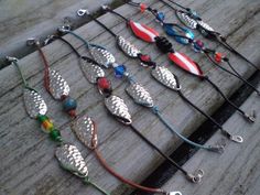 several different types of necklaces are laid out on the ground