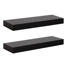 two black shelfs sitting next to each other on a white background and one is empty