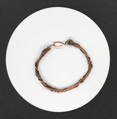 Multiple strands of copper coiled with heavy gauge copper that has been oxidized, polished and sealed. This bracelet is a quick go to fix to complete your everyday outfit. This bracelet is 8" long. Sealed with Protectaclear. ProtectaClear is a clear, protective coating that is tough enough to protect jewelry and is safe for wear against skin. ProtectaClear is practically invisible once applied and will seal and protect jewelry from tarnish, oxidation, and corrosion. Strand Bracelet, Everyday Outfit, Everyday Outfits, Gold Bracelet, Copper, Bracelet, Skin, Gold