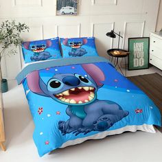 the bed is decorated with an image of stitch and stitch