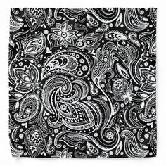 a black and white paisley pattern on fabric