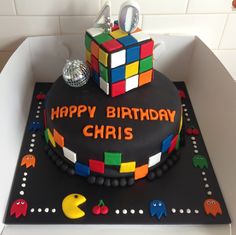 a birthday cake made to look like a rubik cube