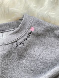 Name Sweatshirt. 50/50 cotton poly unisex sweatshirt. Includes 1-3 names, please keep in mind font size does not change and longer names will cover more of the collar. We can use any pattern you see in our shop at www.Etsy.dukeandfox.com so you can match your fur baby! All our sweatshirts are made to order and ship after a 3-5 day production time. Please message us with any custom request prior to ordering. www.dukeandfox.com Gray Cotton Pre-shrunk Sweatshirt, Gray Crew Neck Sweatshirt With Text Print, Basic Short Sleeve Sweatshirt With Letter Print, Cotton Crew Sweatshirt With Name Print, Short Sleeve Cotton Sweatshirt With Letter Print, Cotton Sweatshirt With Lettering In Relaxed Fit, Cotton Short Sleeve Sweatshirt With Letter Print, Cotton Sweatshirt With Letter Print And Short Sleeves, Cotton Crew Neck Sweatshirt With Text Print