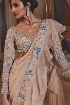 Peach pre-draped saree with cutdana, bead embroidered ruffle border in floral pattern. Paired with bead drops embroidered padded blouse. - Aza Fashions Ruffle Sarees, Saree Georgette, Draped Saree, Peach Saree, Ruffle Saree, Padded Blouse, Drape Saree, Beaded Neckline, Full Sleeves