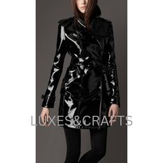 Women's Black Patent Solid Casual Double Breasted Leather Trench Coat / Long Coat with Petite Black Belt, Women's Black Patent Leather Coat - from Luxe & Crafts. Material Type : 100% Genuine Patent Lambskin Leather. Collar : Shirt Style Collar. Length :  Knee Length. Closure Type :  Button Closure along with Outer Waist Belt Closure. Number of Pockets : 2 Side Pockets. Color : Black Lining Material : 100% Premium Lining / Viscose Lining. Care Instructions : Professional Leather Clean Only. Packa Sleek Black Leather Jacket For Party, Sleek Black Double-breasted Leather Jacket, Sleek Black Long Leather Jacket, Black Sleek Double-breasted Outerwear, Sleek Black Double-breasted Outerwear, Black Double-breasted Party Outerwear, Black Double-breasted Leather Office Jacket, Black Double-breasted Leather Jacket For Office, Trent Coat