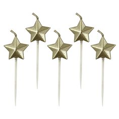 four gold star picks on top of each other