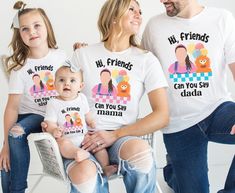 a family wearing matching t - shirts with the words, my friends can you say miama?