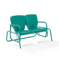 two green chairs sitting next to each other