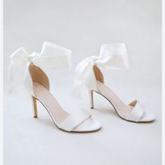 Never Worn Beautiful Ivory Heel. Satin Bow Ties Around Ankle. Company Wouldn’t Return Because It Was Past Return Date. Cream Open Toe Heels With Bow, White Open Heel Heels With Bow, White Heels With Bow And Open Heel, Feminine Cream Open Toe Wedding Shoes, Feminine Fitted White Wedding Shoes, White Low Heel Feminine Shoes, Feminine Cream Ankle Strap Wedding Shoes, Feminine White Open Toe Wedding Shoes, Chic White Wedding Shoes With Bow