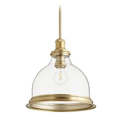 a light fixture with a glass dome hanging from the bottom and a gold metal frame