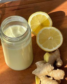 ginger, lemon and ginger juice on a cutting board