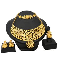 Indian Gold Plated Jewelry Sets Wedding Dubai Choker Necklace Bracelet Earring Ring Nigerian Bridal Set African JeweleryModel Number:1005003058985413 (1) Necklace approx :43cm +5cm. Bracelet approx :19.2cm .One set includes 1 Necklace,1 Bracelet,a pair of Stud Earrings and a Ring. (2) When you go to a banquet, necklace suit will match your dress very well, highlighting your temperament; when you go to a dance party, it will make you look more mature. (3) The jewelry set is packed with a box.Idea Wedding Jewelry Sets With Plating, Wedding Round Alloy Necklace, Round Plated Jewelry For Wedding, Plated Round Jewelry For Weddings, Silver Costume Jewelry Bridal Sets, Plated Round Jewelry Sets For Wedding, Silver Plated Bridal Sets As Gift, Elegant Metal Bridal Sets For Gift, Elegant Metal Bridal Sets As Gift