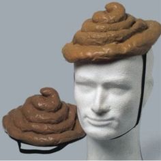 a white mannequin head wearing a brown hat