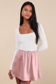 Simple yet darling, the Lulus Delicate Aesthetic Mauve Satin Bow Mini Skirt will make looking cute absolutely effortless! Extremely luxe woven satin shapes this too-cute skirt that features a high, elasticized waist trimmed with crochet lace and a dainty ribbon bow at the center. The flowy, A-line finishes at flirty, slightly rounded mini hem. Fit: This garment fits true to size. Length: Mid-thigh. Size medium measures 15.5" from waist to hem. Waist: Fitted - elastic waist allows stretch. Hip: L Delicate Aesthetic, Dressy Attire, Satin Mini Skirt, Chic Skirts, Skirts For Women, Skirts Online, Satin Skirt, Pink Outfits, Satin Bow