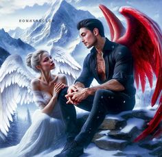 a man and woman sitting next to each other in the snow with wings on them