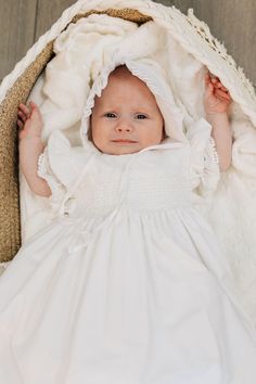 Long Cotton Baby Blessing Dress This baby dress is made of soft, comfortable cotton, and is a great option for summer. It has a simple, but elegant design. With a long skirt, cinched in puffed sleeves, and details at the waist and hem of the dress. This dress is fully lined and has buttons at the back and a tie waist. Comes with a matching bonnet. It is the perfect choice for baby blessings and christenings. Made in the USA. Fabric content: 100% cotton Hand wash cold, hang dry. Do not use bleach Classic Ruffled Baptism Dress, Cream Cotton Baptism Dress, Classic Cotton Baptism Dress, Mens Suit Accessories, White Pants Men, Baby Blessing Dress, Vintage Baptism Dress With Lace Trim, Vintage Cotton Baptism Dress With Lace Trim, Sweetheart Bridal