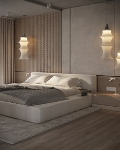 a large bed sitting in the middle of a bedroom next to two lamps on either side of it