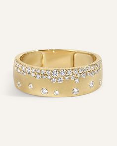 a gold ring with diamonds on it