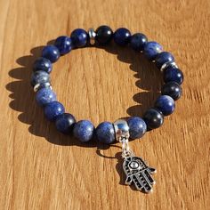 8mm Sodalite Beaded Stretch Bracelet Handmade By Me Hamsa Tibetan Silver Charm Stainless Steel Rondelles Fits Up To 7" Wrist New Ring Not Included Adjustable Sodalite Beaded Bracelets With Round Beads, Blue Sodalite Beaded Bracelets With 8mm Beads, Adjustable Sodalite Beaded Bracelets With 8mm Beads, Handmade Sodalite Round Bead Bracelets, Blue Sodalite Hand-strung Beaded Bracelets, Hand-strung Blue Sodalite Bracelet, Blue Hand-strung Sodalite Bracelet, Blue Sodalite Hand-strung Bracelet, Blue Sodalite Gemstone Beaded Bracelets